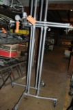 (2) GRAY PORTABLE FOUR ARM RACKING UNITS ON CASTERS