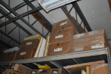 LARGE ASSORTMENT OF CEILING TILE ON TOP SHELF OF RACK