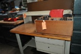 TAN METAL WORKBENCH WITH TWO DRAWERS AND