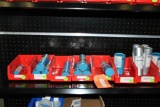 SMALL RED BINS WITH ASSORTED TOOLING ON THIRD SHELF FROM TOP