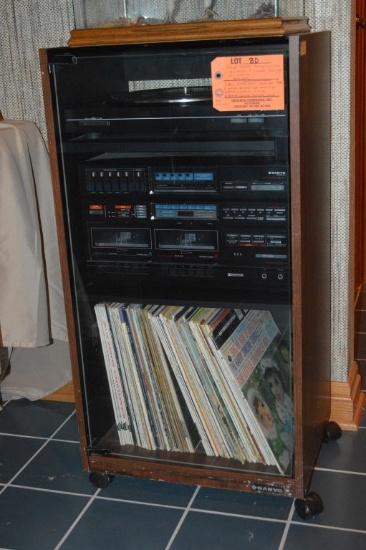 SANYO STEREO DOLBY SYSTEM IN GLASS AND WOOD CABINET