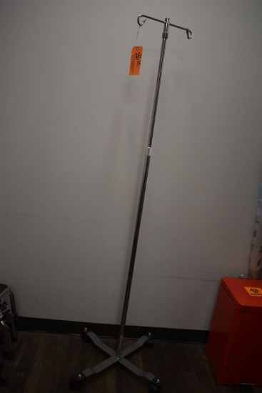ROLLING I.V. POLE ON CASTERS