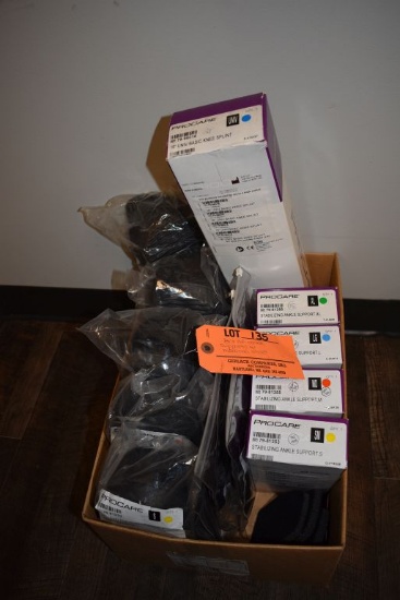 BOX OF ANKLE SUPPORTS AND MEDICAL SHOES
