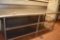 STAINLESS STEEL TABLE WITH LOWER SHELVES,