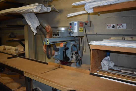 RADIAL ARM SAW WITH LONG TABLE EXTENSIONS,