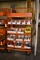 ORANGE ROLLING SHELVING UNIT, ADJUSTABLE SHELVES,
