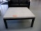 BLACK METAL FRAMED COFFEE TABLE WITH SOLID SURFACE TOP,