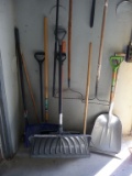 ASSORTED SHOVELS, RAKES AND BRUSHES