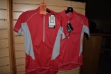 (1) MEDIUM AND (1) SMALL WOMEN'S BIKE SHIRTS,