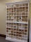 (2) STACKED WHITE SHELVING UNITS WITH CUBBIES FULL