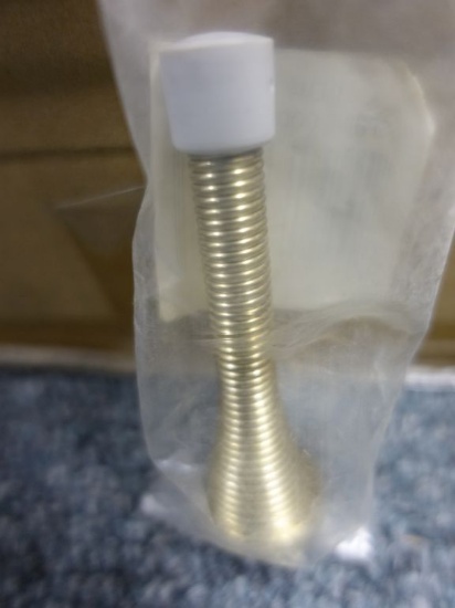APPROX. (500) BRASS PLATED SPRING TYPE 3" DOOR STOPS