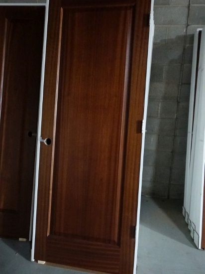 (9) 30" x 80" MAHOGANY RAISED PANEL DOORS,