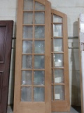 FOUR PIECE ARCHED TOP DOOR WITH BEVELED GLASS LITES,
