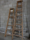 (2) WOODEN STEP LADDERS, (1) 8' AND (1) 6'