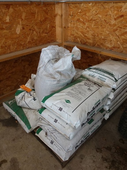 PALLET OF FERTILIZER AND PARTIAL BAG OF SEED