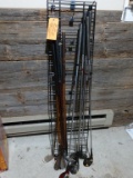METAL DISPLAY UNIT WITH PEGS AND ASSORTED GOLF CLUBS