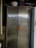 TWO DOOR METAL CABINET ON CASTERS WITH CONTENTS,