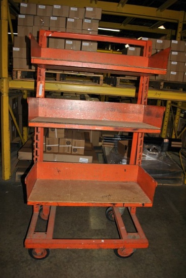 64" HIGH STOCK RACK ON CASTERS WITH THREE 33" WIDE