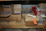 ASSORTMENT OF WOOD AND PLEXI GLASS PIECES ON