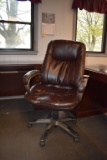 BROWN VINYL EXECUTIVE TYPE CHAIR, SOME DAMAGE TO VINYL