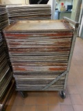 APPROX. 75 ALUMINUM BAKERY TRAYS ON ROLLER BASE