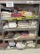 LARGE ASSORTMENT OF TOWELS AND RAGS ON SHELVING UNIT