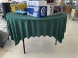 ROUND FOLDING TABLE WITH PLYWOOD TOP RINGED IN