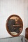 BROWN WOOD FRAMED MIRROR, OVAL, 31