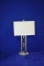 SILVER LAMP W/GLASS BOTTOM, CREAM RECTANGULAR SHAPED SHADE,