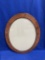 BROWN OVAL FRAME, APPROX. 33