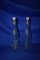 (2) GLASS GEYER FRERES BOTTLES W/ATTACHED LIDS