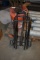 BLACK METAL LUGGAGE CARRIER ON WHEELS