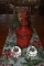 PAIR OF GLASS CUT CANDLE HOLDERS AND RED 2-PIECE
