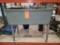 GRAY PLASTIC BIN ON METAL STANDS, APPROX. 35
