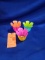 (3) FLOWER SHAPED COLORED CANDLE HOLDERS