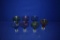 (7) SHORT COLORED WINE GLASSES