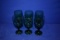 (11) GREEN GLASSES (6-ON DISPLAY, 5-IN BOX UNDER TABLE)