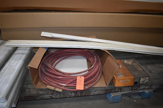 LOT: WHITE BASE BOARDS, GARDEN HOSE, TP RUBBER WALL