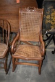 ANTIQUE WOODEN ROCKING CHAIR W/CANED SEAT & BACK