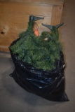 (2) SMALL PRELIT CHRISTMAS TREES IN BLACK BAG,