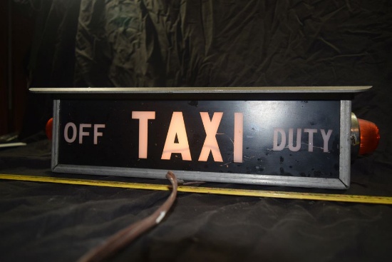 LIGHTED TAXI SIGN