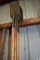 LONG HANDLED SHINGLE SCRAPERS ON HOOKS AND ON FLOOR BENEATH