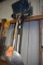 SNOW SHOVELS, COAL SHOVELS ON HOOKS AND FLOOR