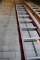 32' WERNER FIBERGLASS EXTENSION LADDER, ORANGE