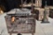 METAL GRATE CRATE WITH WOOD PIECES