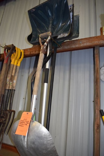 SNOW SHOVELS, COAL SHOVELS ON HOOKS AND FLOOR