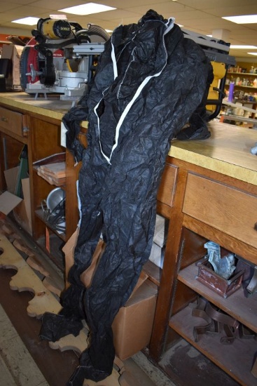 BOX OF BLACK DISPOSABLE COVERALLS