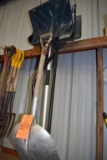 SNOW SHOVELS, COAL SHOVELS ON HOOKS AND FLOOR