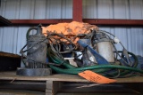 STACK OF ASSORTED SUMP PUMPS, MOTORS, HOSES AND MISC.