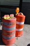 (2) ORANGE/WHITE SAFETY BARRELS WITH YELLOW FLASHING LIGHT